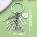 Detailed macro view of Father's Day tool keychain showing dimensions: 6.5cm x 3cm - Heart Dad Motorcycle Tools Style (ER655)