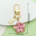 Pink enamel cherry blossom keychain with gold lobster clasp and size dimensions 6.2cm - Cherry Blossom Style (LS525) / Pink
