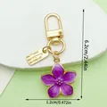 Elegant purple enamel cherry blossom flower keychain with golden U-shaped clasp and tag - Cherry Blossom Style (LS527) / Purple
