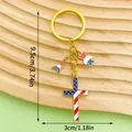 USA flag cross keychain with Eiffel Tower charm for Independence Day commemorative gifts - Cross Bear Eiffel Tower Style (ER1673)