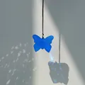 Blue butterfly sun catcher pendant with vibrant light refraction for garden decor. - Brown Rope / Peacock Blue