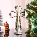 Detailed view of a faceted clear crystal cross ornament with festive Christmas background - Cross Ornament / 100*150mm / Clear