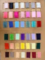 Professional color swatch card displaying ruffled polyester ribbons in various vibrant shades - 1cm x 91.4m (100 Yards)