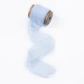 Elegant light blue chiffon ribbon on wooden spool for romantic DIY craft projects. - Sky Blue