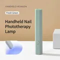 Hexagonal rechargeable handheld UV LED nail lamp for fast drying manicures in mint green color - Fresh Green