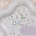 Mixed nail art rhinestone material pack with K9 crystal hearts and round drills - Champagne Moonlight Gem Box