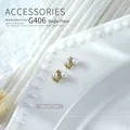 Elegant gold-tone bow nail art charm featuring pearls and zircon, size 6x7mm. - Gold Asymmetric Pearl Bowknot (g406) / 1 Piece (6*7mm)