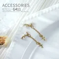 Elegant golden bow nail art charms featuring white pearls and delicate cross chain detail - Gold Bowknot Cross Tassel (g411) / 1 Piece (36*6mm)