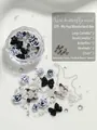 Premium black and white nail art charm set featuring camellia flowers and bow knots - Ink Birch Wonderland Box