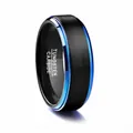 Detailed macro shot of 8mm black brushed tungsten carbide ring with blue stepped edges - Size 7 / Black and Blue