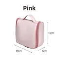 Compact pink travel toiletry bag with 19x16x6cm dimensions and sturdy portable handle - 19x16x6cm / Pink