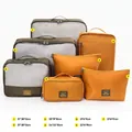 Professional 7-piece orange and olive green travel organizer set with mesh panels - 7-piece Set / Turmeric