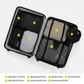 7-piece black travel packing cube set with various sizes for suitcase organization - Black