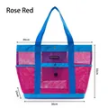 Magenta mesh strandtas met blauwe bies en afmetingen 49x33cm - Rozerood