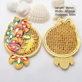 Detail view of ancient gold hollow peacock pendant with intricate colorful enamel work - Style 2 Large Round Peacock Pendant