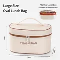Grote beige geïsoleerde ovale lunchtas met draaggreep en stevige ritssluiting - Ovaal / L
