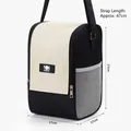 Portable black insulated lunch bag with adjustable shoulder strap and large opening lid - Black