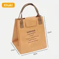 Khaki DuPont paper insulated lunch bag with 20x17x23cm dimension markings - Turmeric