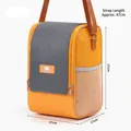 Insulated orange lunch bag with adjustable shoulder strap and mesh side pocket 17x17x27cm - Orange