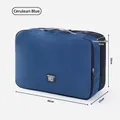 Große blaue Reisekompressionstasche, 40x28x15cm, tragbarer Organizer für Kleidung - Azurblau