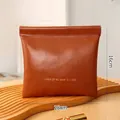 Large brown portable faux leather storage pouch for makeup and sanitary napkins 18x16cm - L / Brown