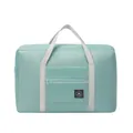 Large mint green portable travel storage bag with suitcase handle sleeve for clothes. - Light Blue