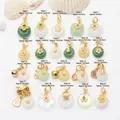 Collection of 21 traditional Chinese jade chalcedony pendants with gold-plated details - Style 1(1号款)