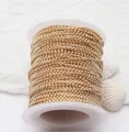 Detailed view of a spool of 14K gold filled bead chain for DIY jewelry making crafts. - 1.2 Ball Chain / 14K Gold