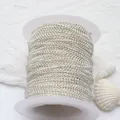 Close-up of a silver bead chain spool for DIY jewelry making and craft projects. - 1.2 Ball Chain / Silver