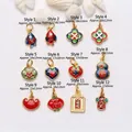 Macro detail view showing 12 styles of colorful enamel and gold charms for DIY jewelry. - Auspicious Cloud Style (11) / Ancient Gold Style