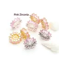 Detailed view of pink cubic zirconia wheel-shaped spacer beads for jewelry making - Wheel Spacer / Large 12mm (14K Gold Tone) / Pink