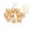 Detailed close-up of 14K gold-filled waist spacer beads with micro-set zircons for DIY jewelry - White Zirconia (GF-464) / 14K Gold