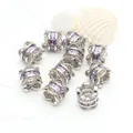 Macro detail of silver plated spacer beads with micro-set purple zircons - Purple Zirconia (GF-464) / White Gold