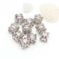 Close-up detail of micro-paved pink zircon small waist spacer beads for DIY bracelets - Pink Zirconia (GF-464) / White Gold