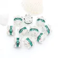 Macro detail of emerald green zircon waist spacer beads with ornate silver scalloped edges - Green Zirconia (GF-464) / Silver