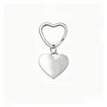 Detailed view of silver stainless steel heart-shaped keychain with polished pendant - Steel