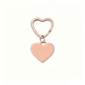 Close-up of rose gold heart-shaped stainless steel keychain with polished finish - Rose Gold