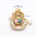 Detail of rotatable gold gourd pendant with colorful enamel mantra symbols. - Hollow Rotatable Lucky Gourd Pendant (GF-355) / Style 2
