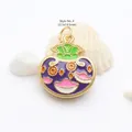 Detailed view of enamel style 4 pendant measuring 22.5x19.5mm on white shell background. - Style 4
