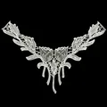Detailed close-up view of a white polyester embroidered lace collar with hollow floral patterns. - Tulip Embroidery (LG699) / White