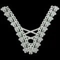 Close-up of elegant white embroidered lace false collar with hollow floral patterns - White