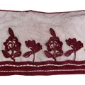 Detailed macro view of wine red floral embroidered mesh lace trim for DIY garment accessories - Burgundy