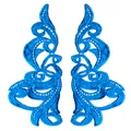 Close-up of bright blue water-soluble embroidery lace patches with symmetrical scroll design - Blue