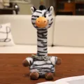 Adorable long-neck zebra plush toy with a green plaid bowtie sitting on a wooden table - Zebra / 23cm