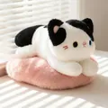 Adorable soft black and white cow cat plush doll lying on a pink furry cushion - Cow / 25cm