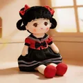 Adorable plush girl doll wearing a red and black school uniform dress with bows - Small 45cm / Red