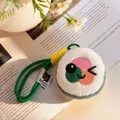Cute plush sushi roll keychain with embroidered winking face and green strap lanyard - Playful Expression / 10cm