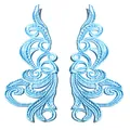 Detailed texture of symmetrical light blue water-soluble embroidery lace patches. - Sky Blue