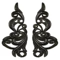 Macro view showing the intricate texture of symmetrical water-soluble lace floral appliques - Black