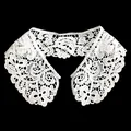 Detail view of intricate white floral embroidery on a water-soluble lace faux collar - White